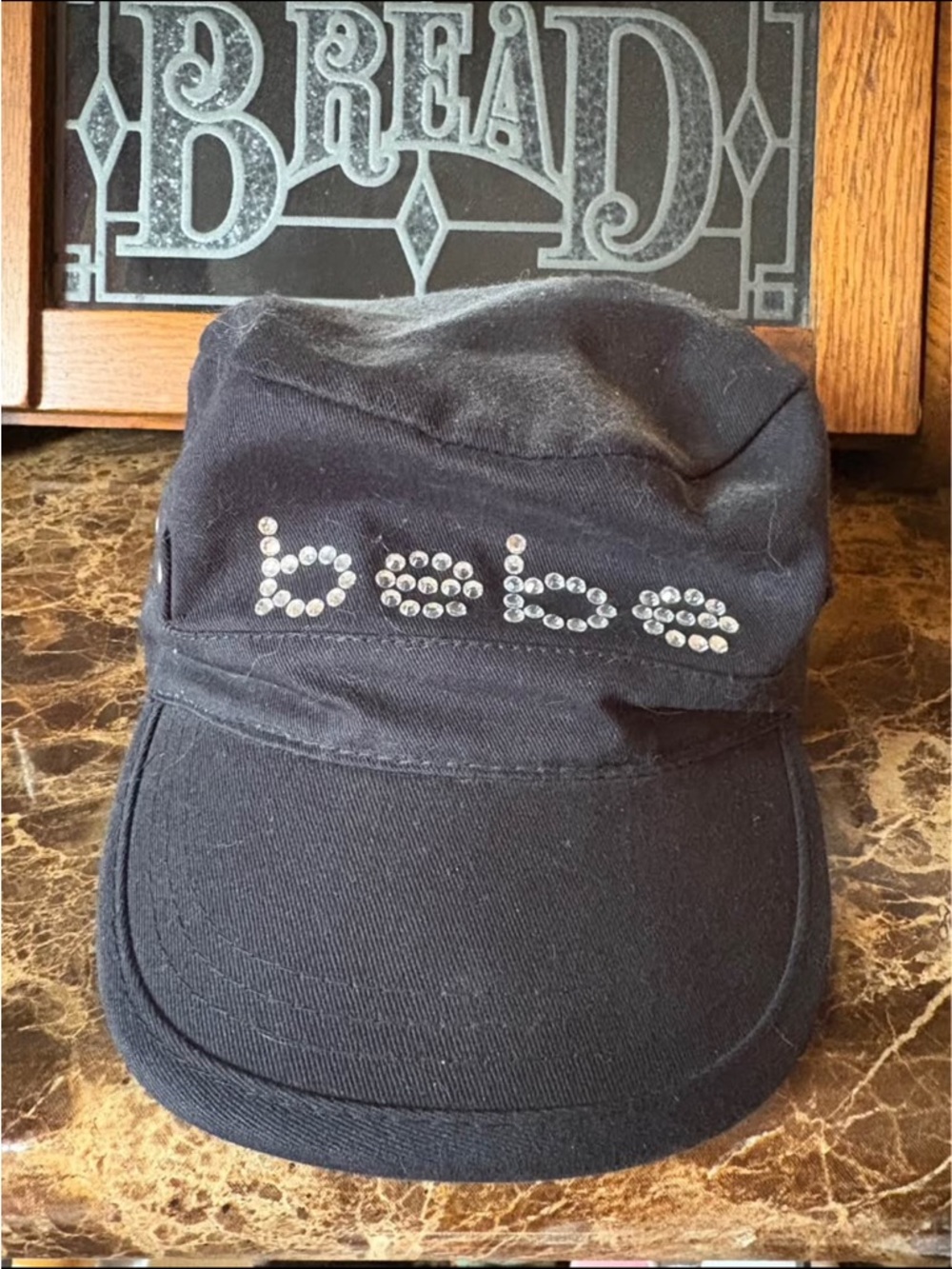 bebe Women Black Cap with Rhinestone Logo